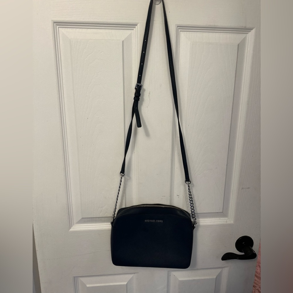 Michael Kors blue chain crossbody pocketbook.